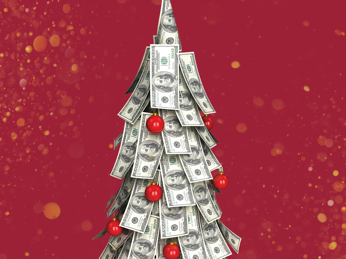 a Christmas tree made of folded $100 bills with red ornaments, set against a deep red glittery background.