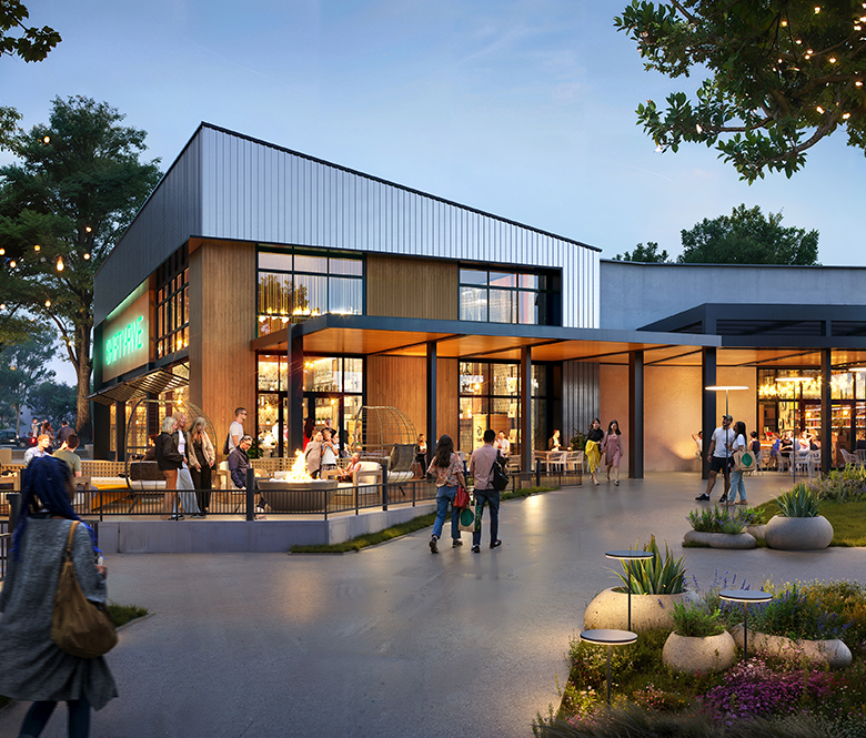 People walking into a modern shopping center with fire pit