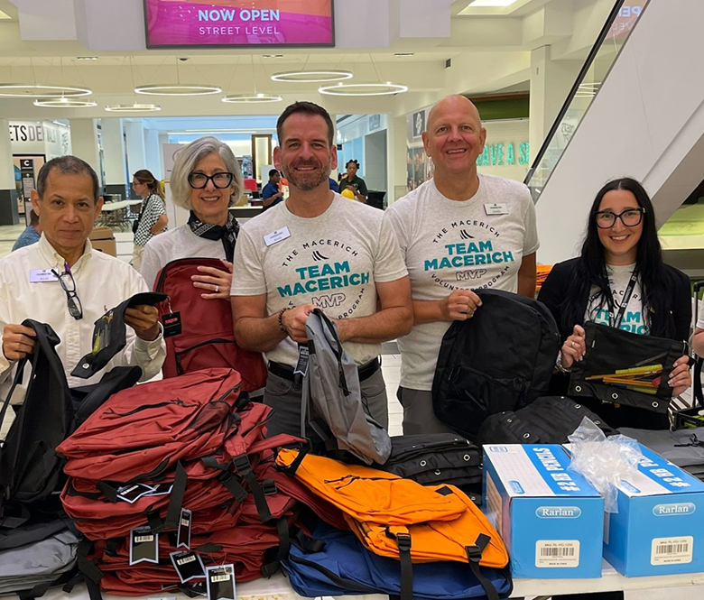 Macerich employees at a back-to-school donation drive event