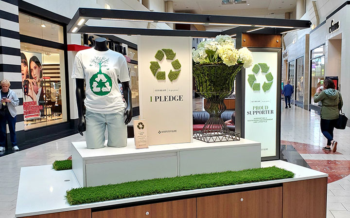 An environmentally-themed kiosk in a Macerich shopping center