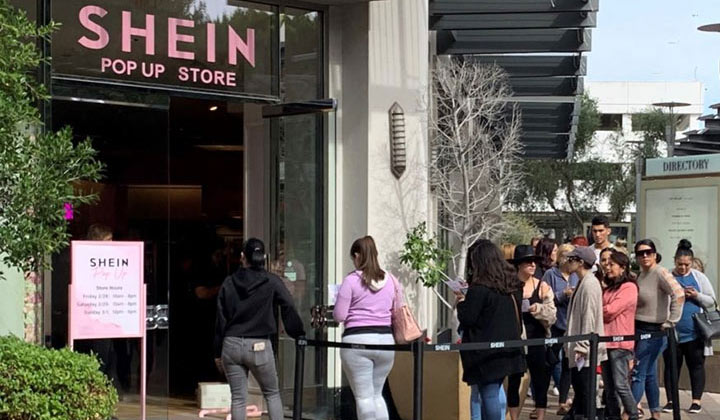 Customers in line for a Shein popup store