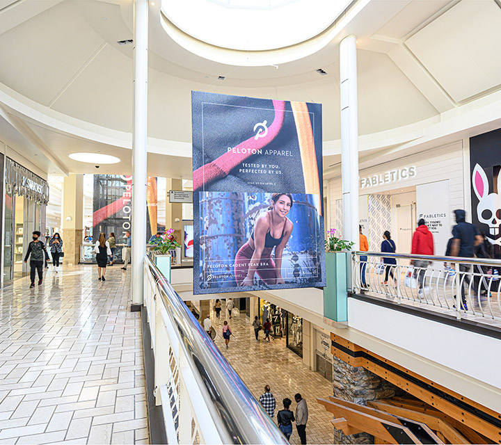 Peloton taking advantage of a Macerich Media Network opportunity with a large-format banner