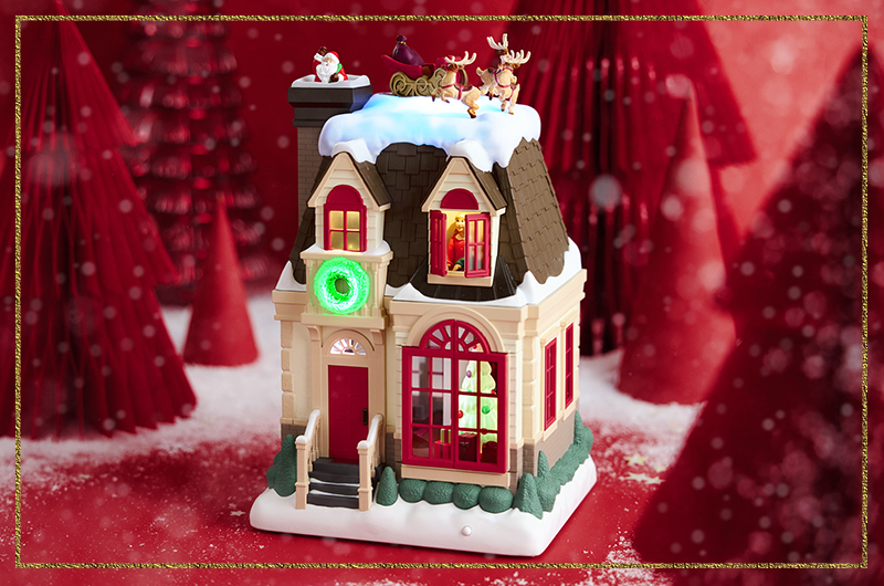 christmas ornament shaped like a house in the show