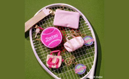 barbie branded keychains on top of a tennis racket
