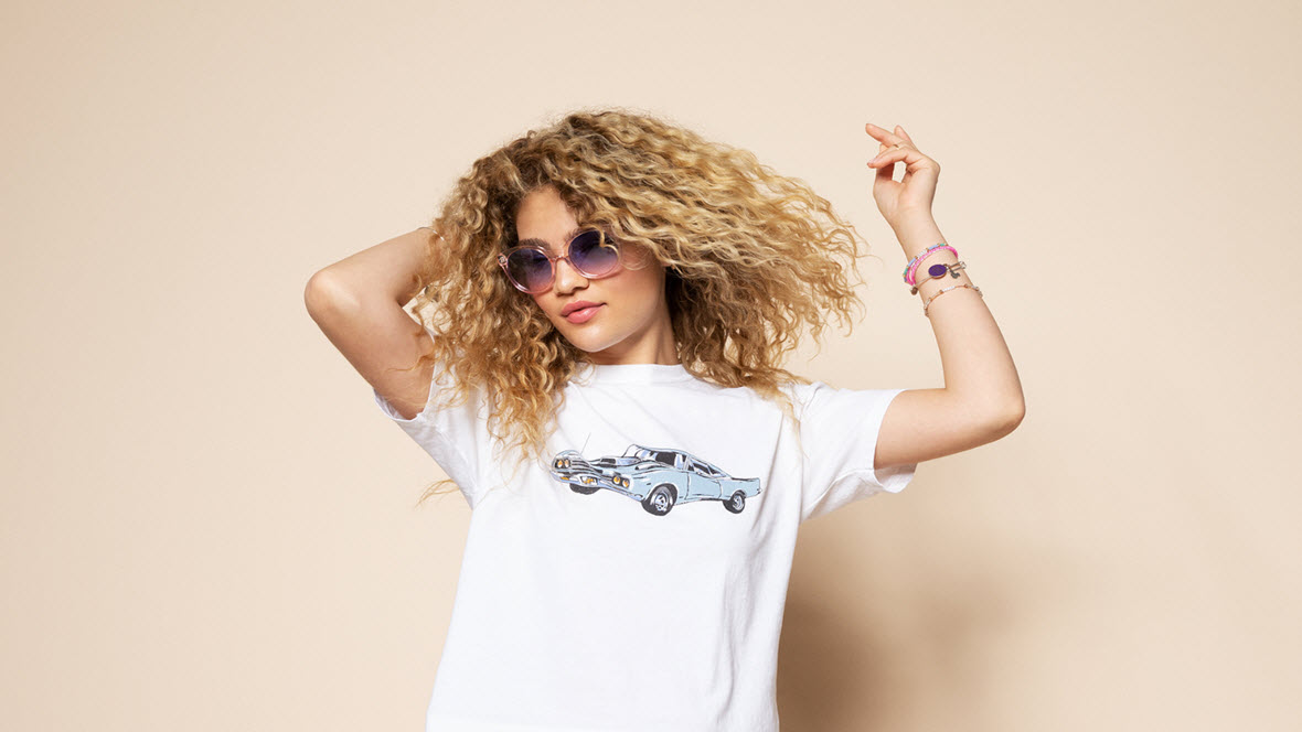 Curly-haired girl dancing