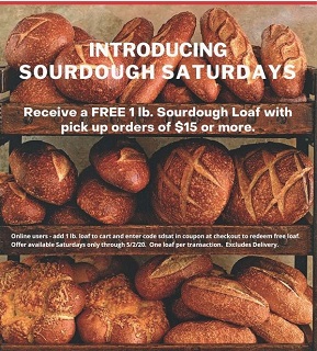 Image includes several loaves of sourdough bread in different shapes and sizes.