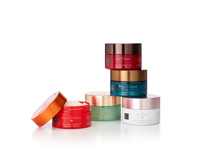 Body scrub containers stacked up.
