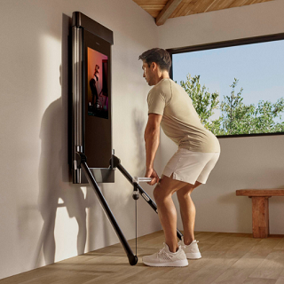 Man using Tonal Home Gym.