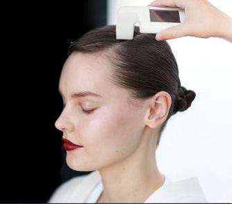 Women receiving scalp treatment.