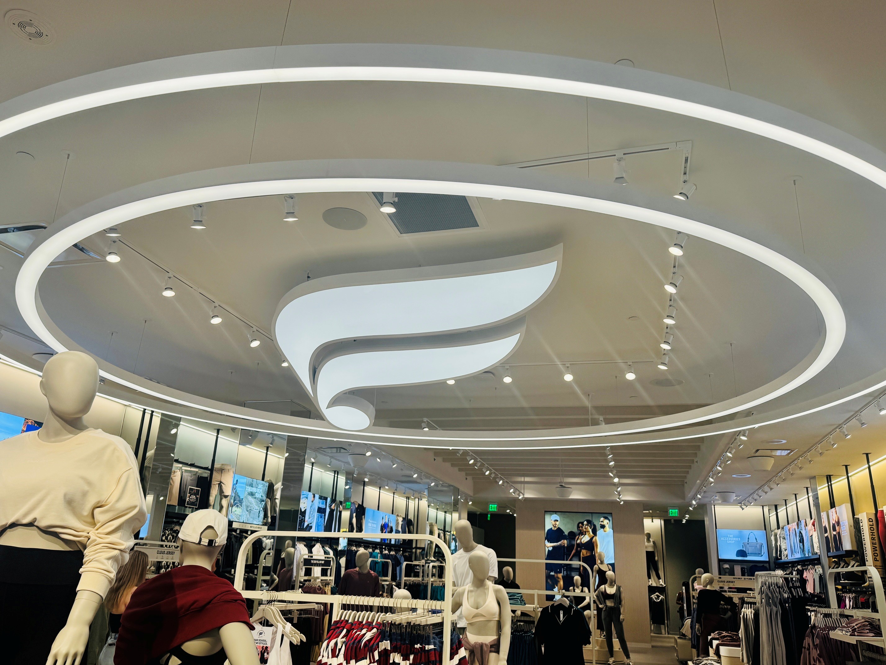 Fabletics logo on ceiling of new store. 