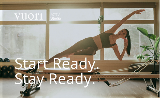 woman doing pilates in workout gear 