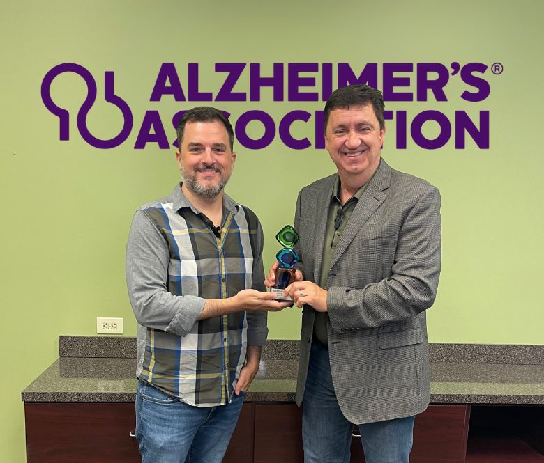 Nonprofit of the Month award presentation.