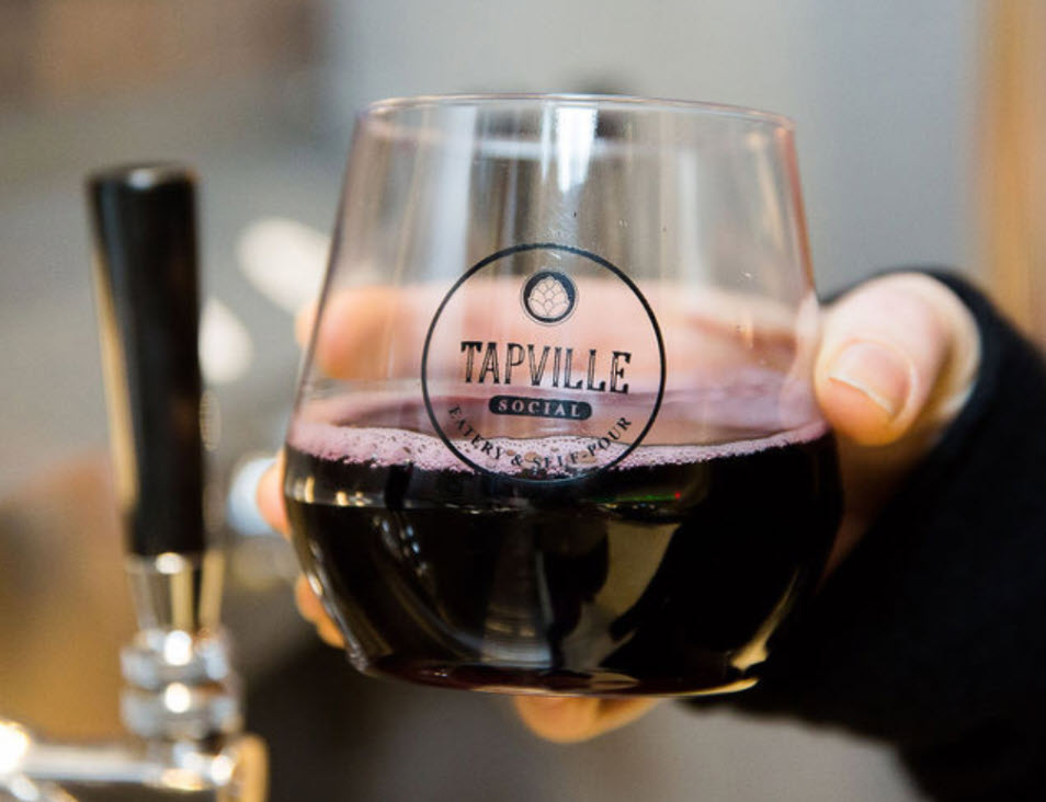 Image of red wine in a Tapville wine glass.