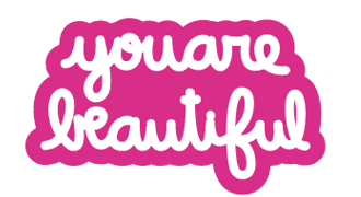 Pink sticker that says "you are beautiful" in white cursive text. 