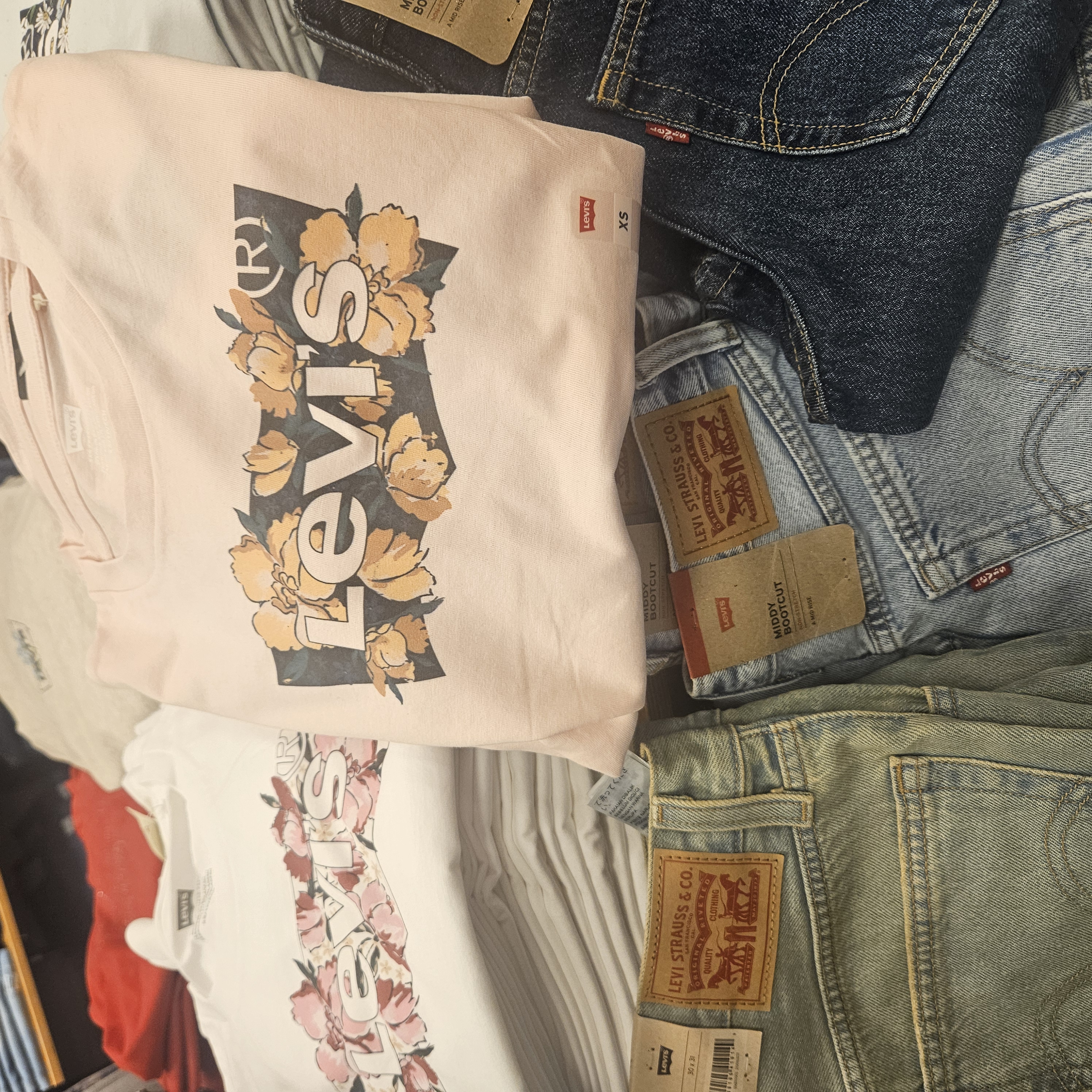 Photo of ladies Levi's tshirts and jeans