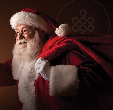 Happy Santa in front of a red background