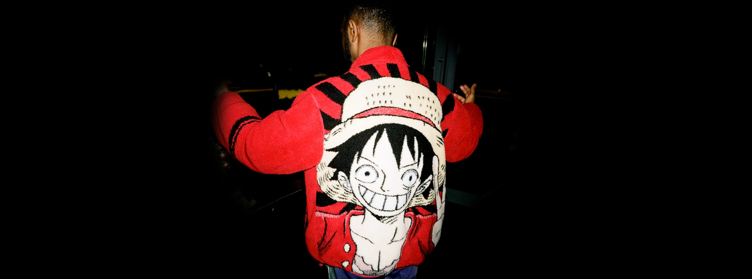 Photo of person wearing an anime themed shirt 