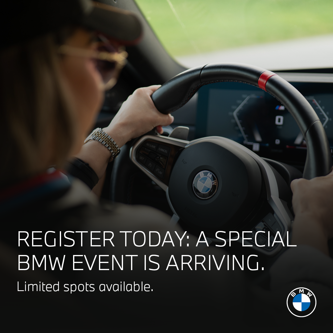 Someone driving a BMW with the BMW logo on the steering wheel. Copy reads "REGISTER TODAY: A SPECIAL BMW EVENT IS ARRIVING. Limited spots available."