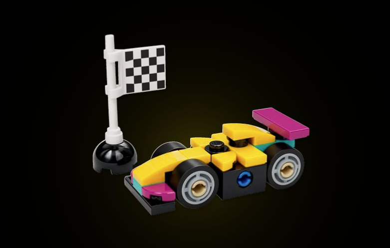 A small toy race car made from colorful building blocks sits next to a black-and-white checkered flag on a black background.