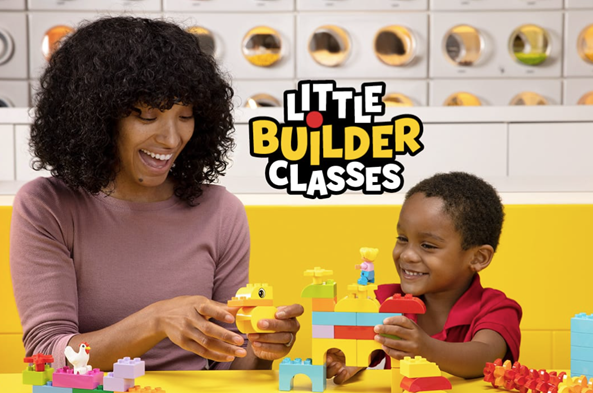 An adult and a young child smile while building colorful block creations together at a table, with text reading “Little Builder Classes.”