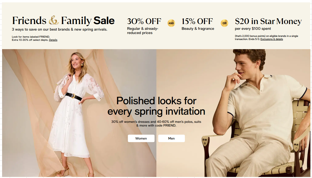 Female model standing in white dress and male model sitting in tan pants and tan shirt.