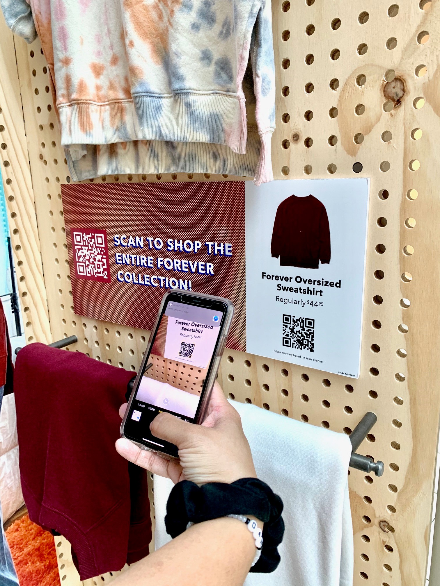Scanning QR Code from Mobile Display. Working says: Scan to shop the entire forever collection. Forever Oversized Sweatshirt Regularly $44.95