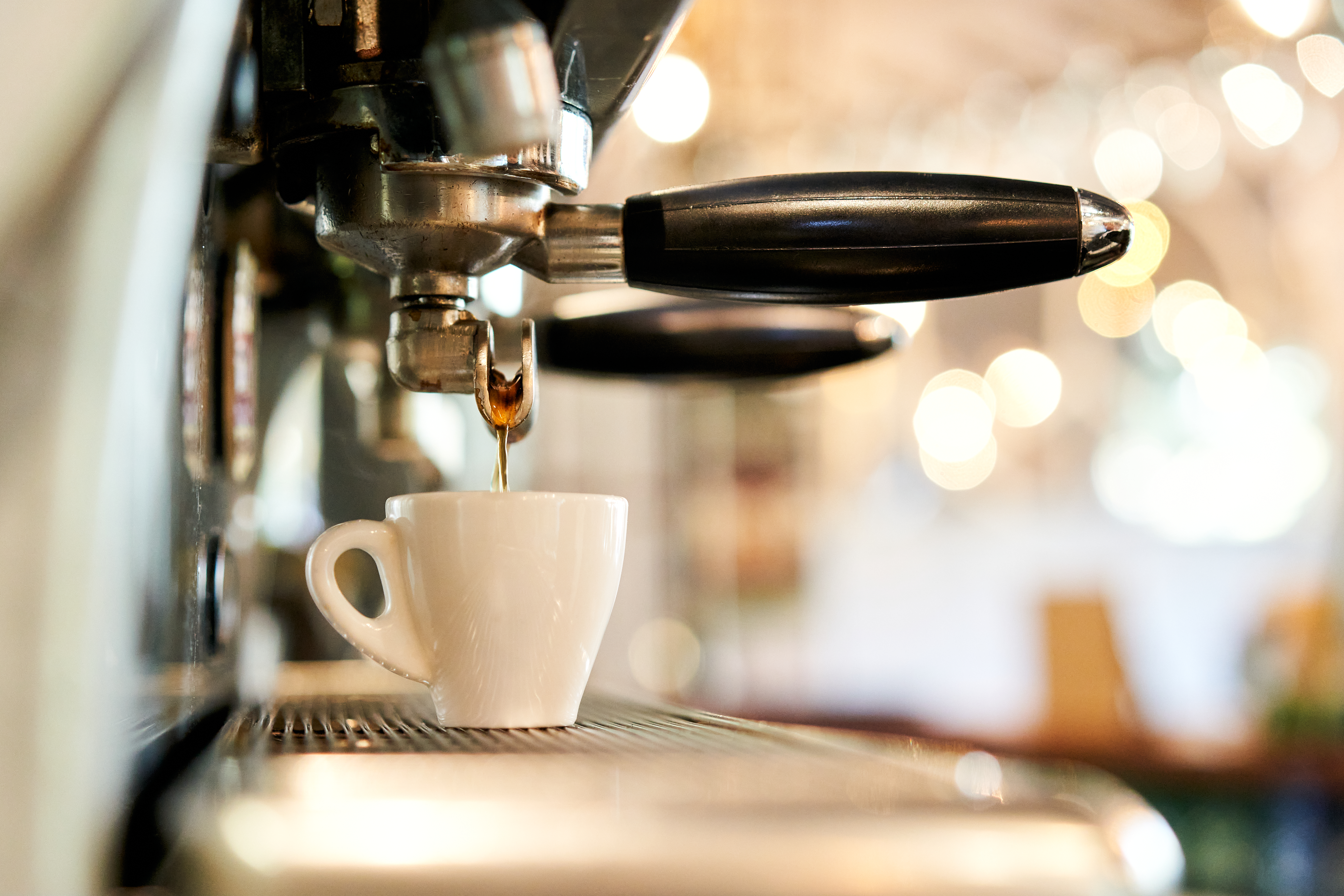 espresso machine making a cup of espresso