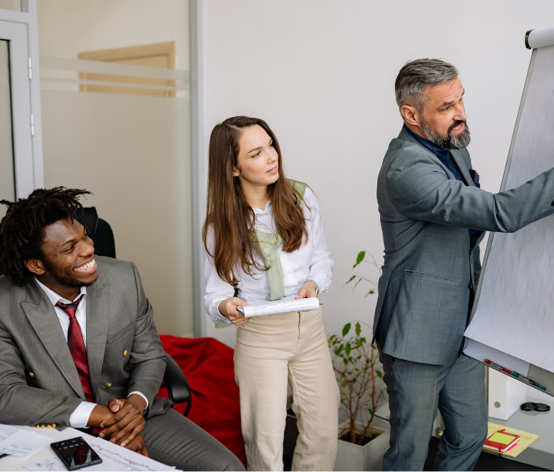 3 business executives at a meeting