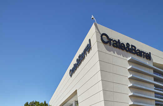 Image of Crate & Barrel sign on the storefront. 