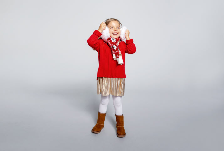 Girl jumping in confetti