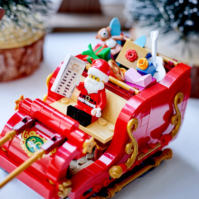 Lego Santa on sleigh with toys