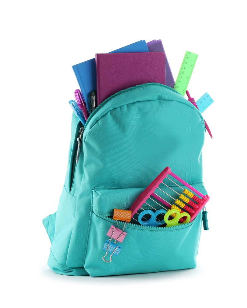 Backpack stuffed with school supplies
