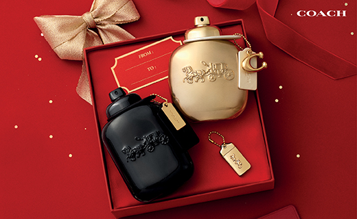 Picture of two coach fragrance bottles side by side in a gift box.
