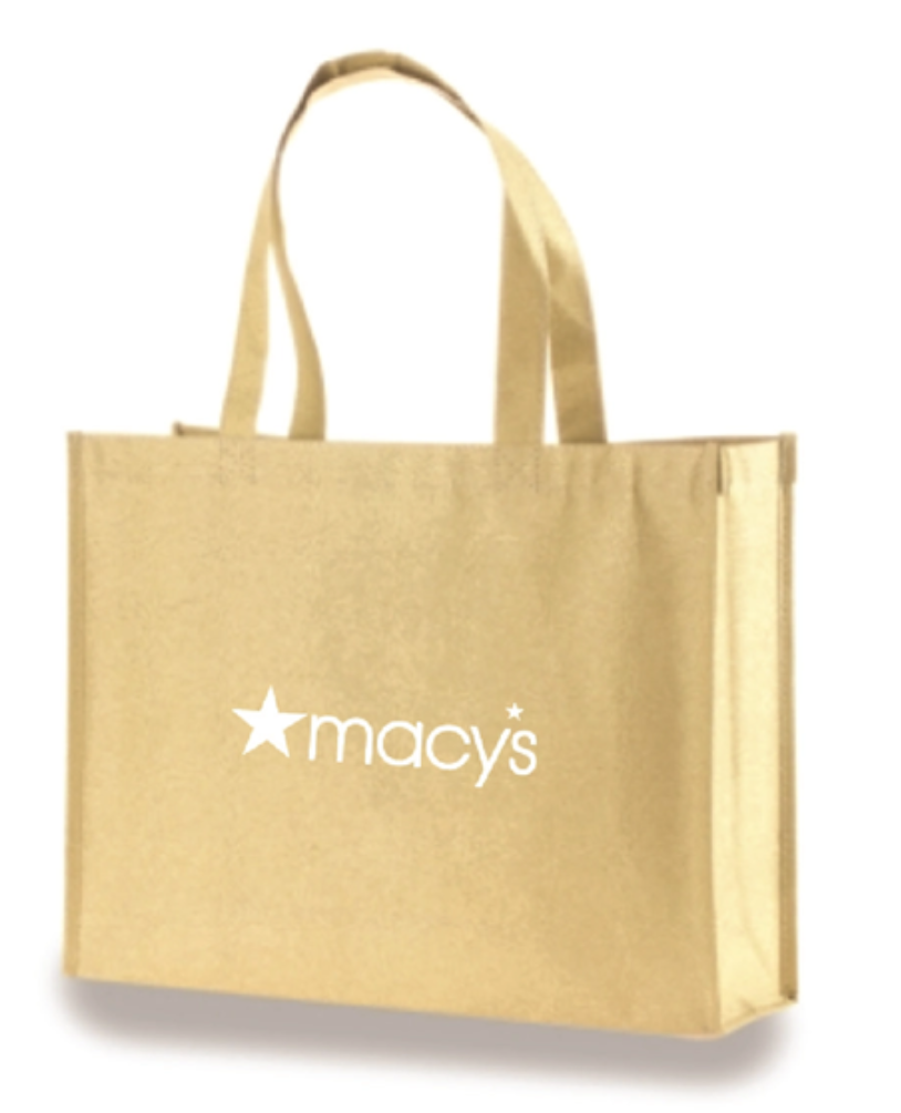 A tan tote bag with Macy's logo on the front.