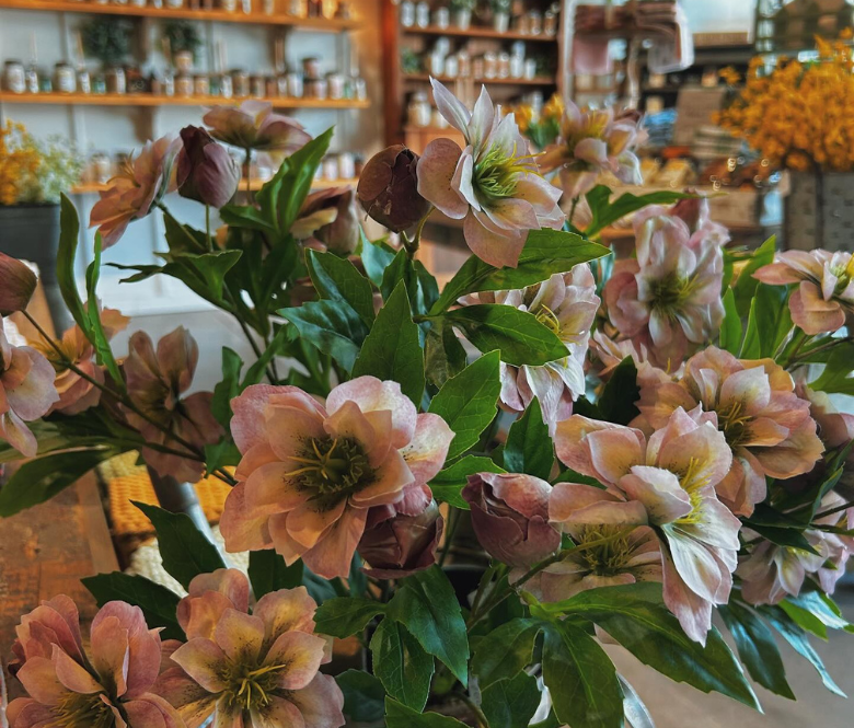 Flowers displayed in a home goods store.