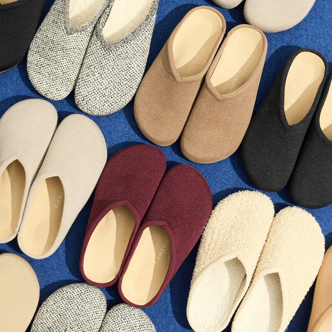 pairs of clogs lined up in rows