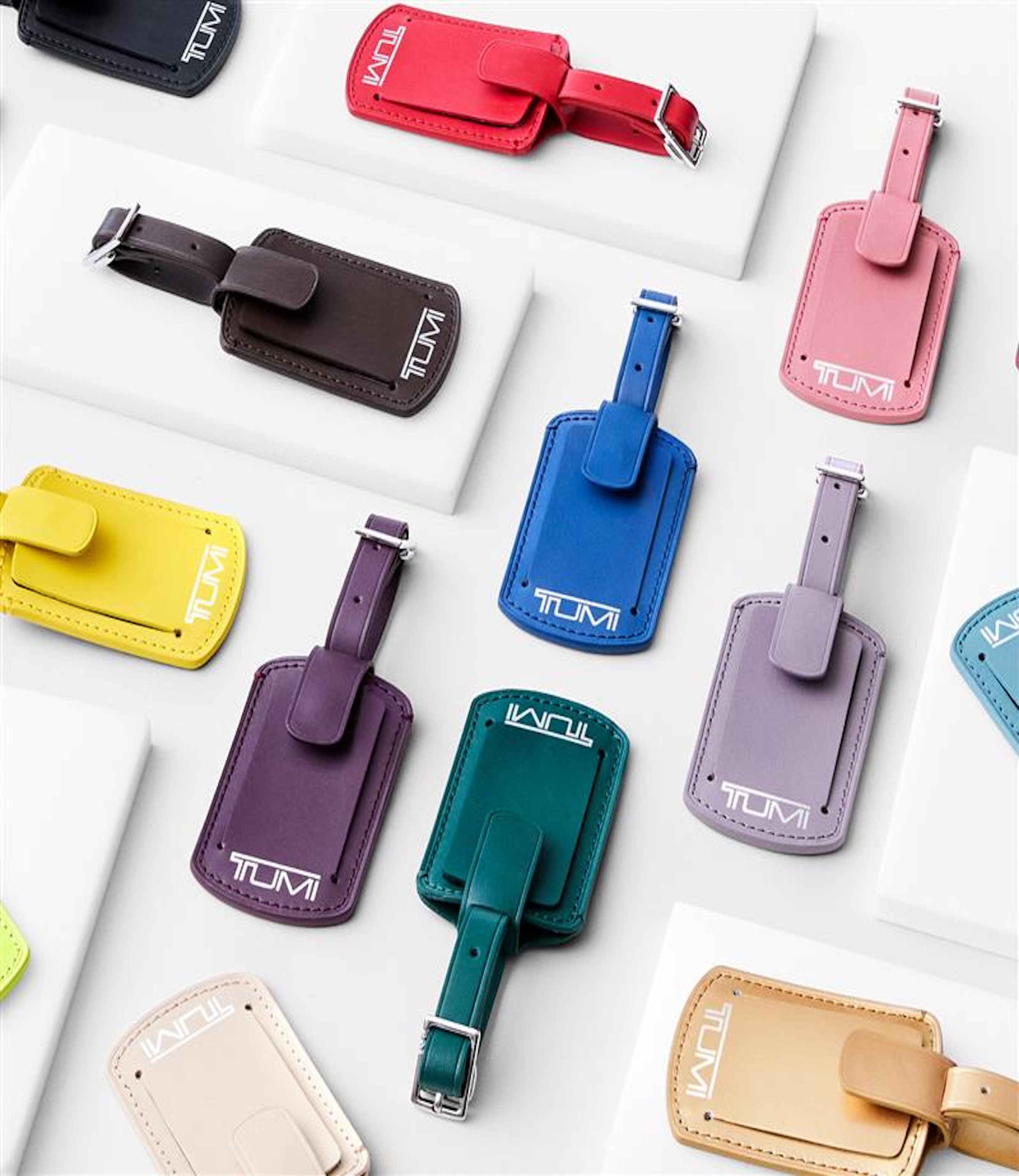 different colored tumi luggage tags 