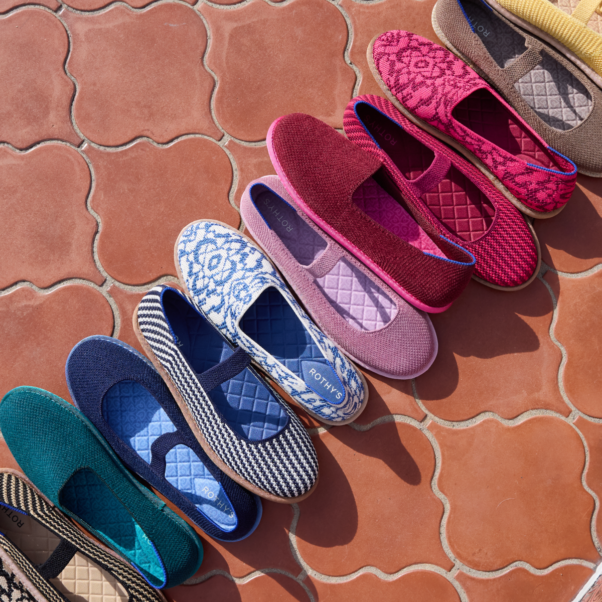 line of colorful rothy's shoes