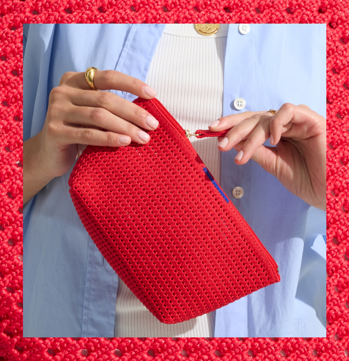 woman holding red pouch