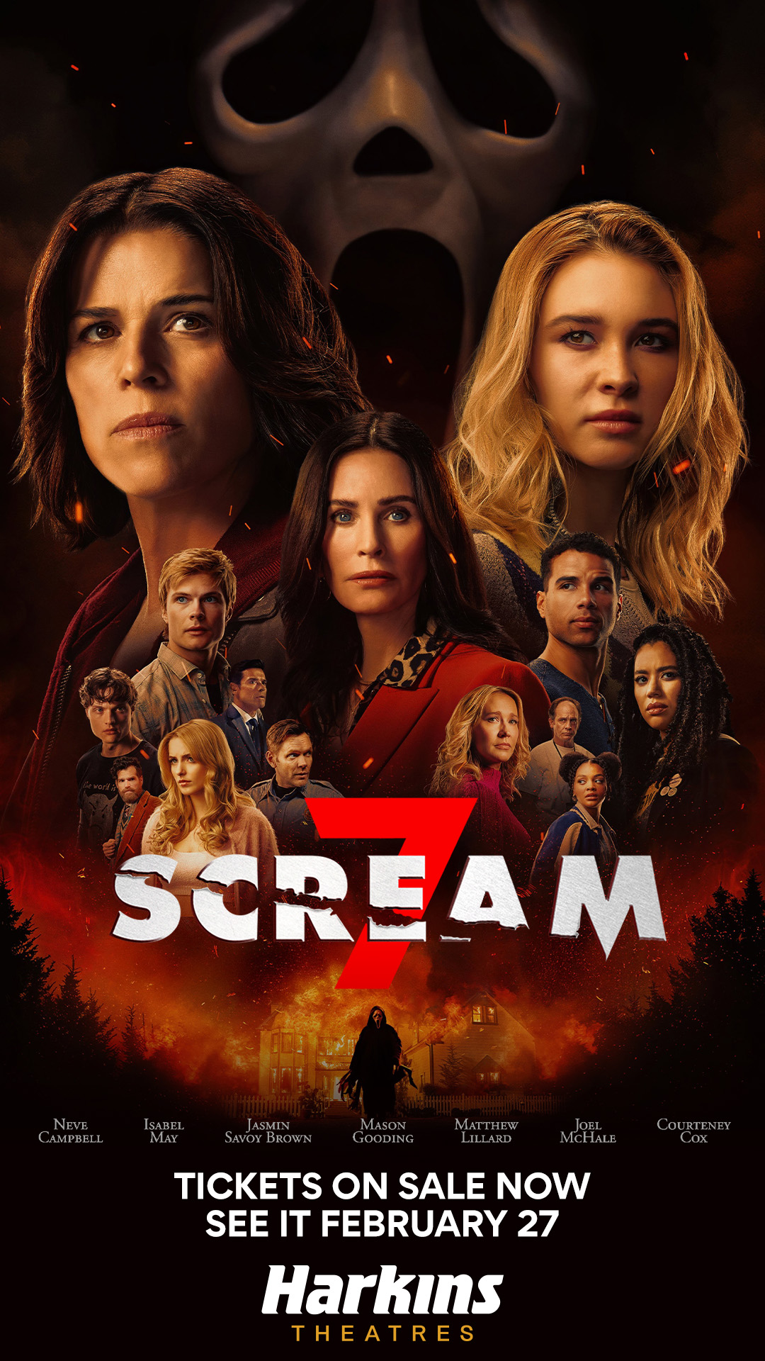 faces of the cast with a scream mask in the background