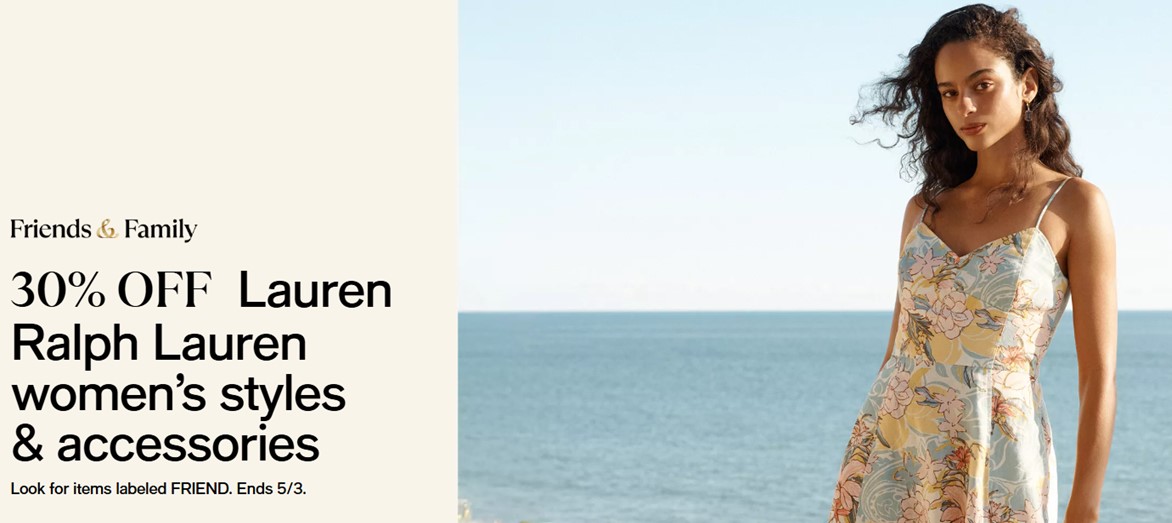 girl standing by the ocean in a dress
