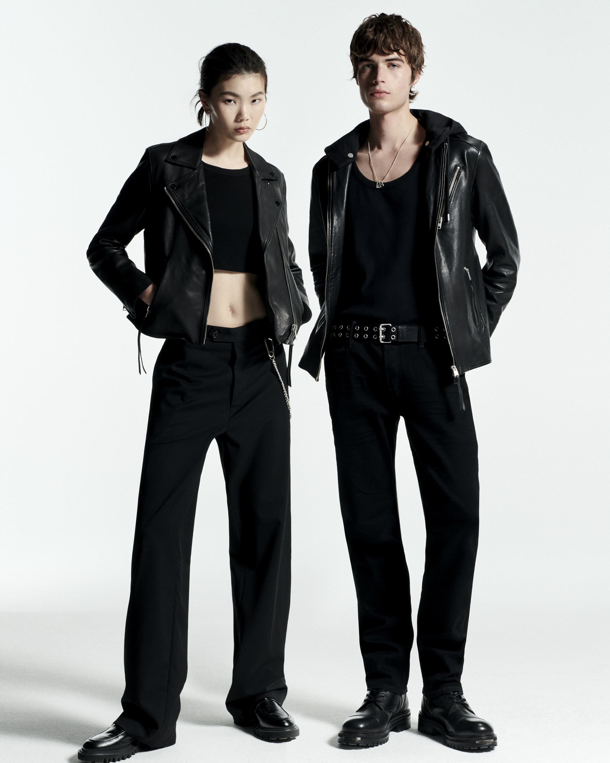 girl and guy wearl all saints all in black. Jeans, shirts and leather jackets 