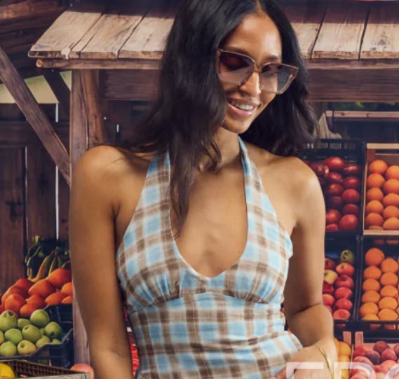 girl wearing sunglasses smiling 