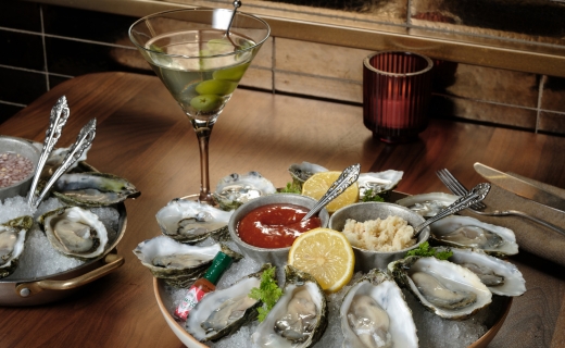 tablescape with oysters and martini