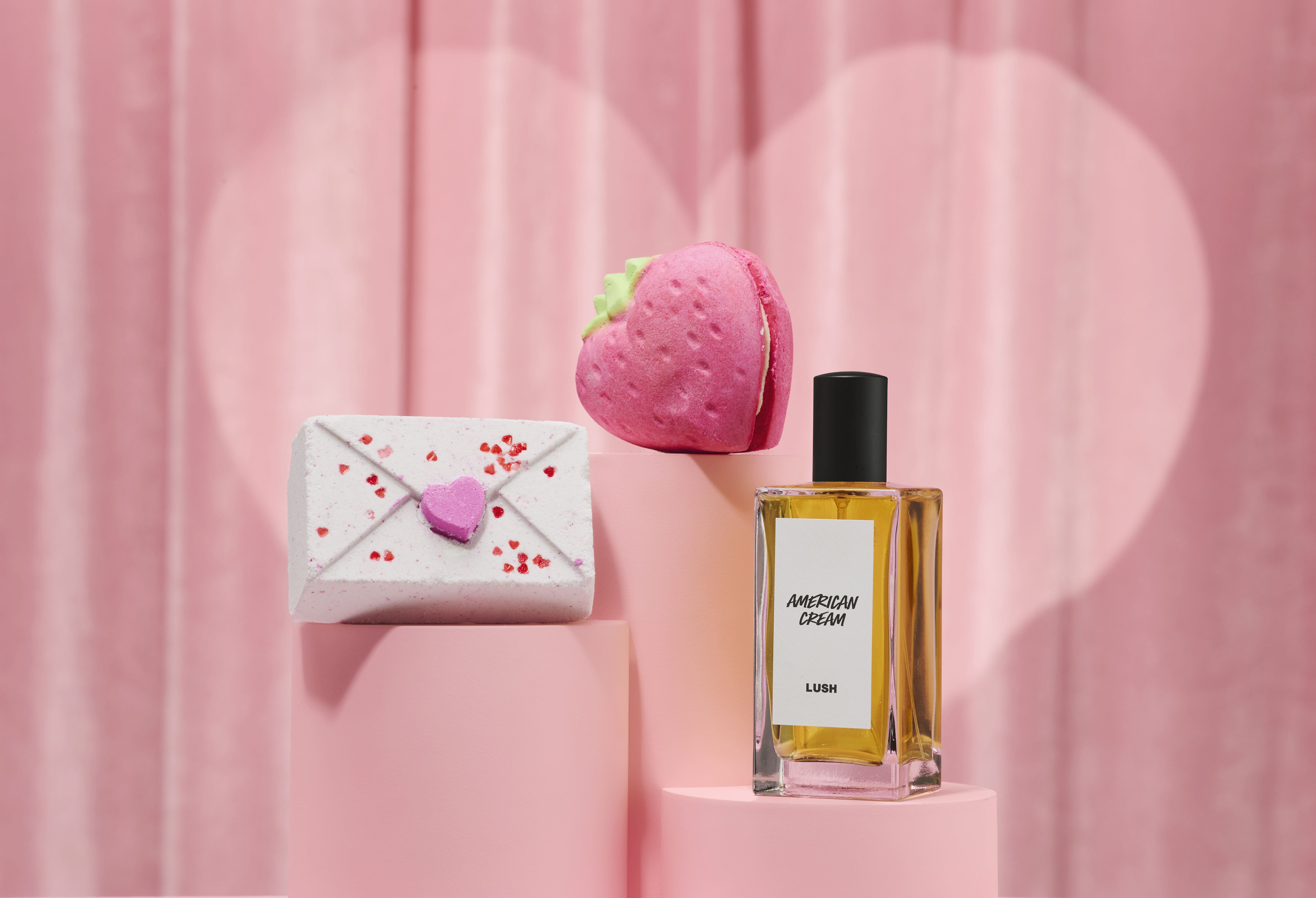 picture of bath bombs with oil bottles in fruit shapes.