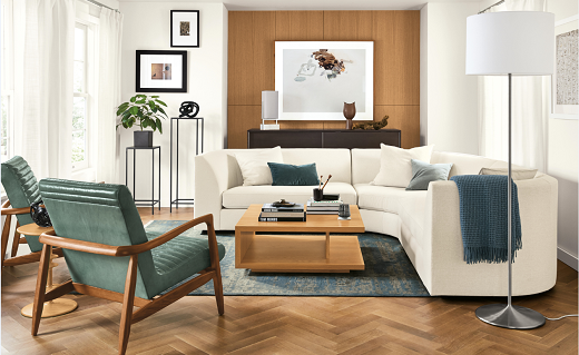 Living room with two chairs and a white sectional couch