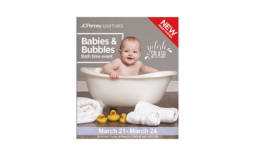 Baby in bathtub with rubber ducks