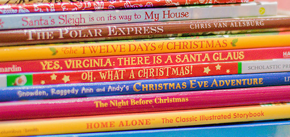 a stack of Christmas books including: "Santa's Sleigh is on it's way to my House", The Polar Express", The Twelve Days of Christmas", Yes, Virginia: There is a Santa Claus", Oh, What a Christmas", Snowden, Raggedy Ann and Andy's Christmas eve Adventure", The Night Before Christmas", "Home Alone" 