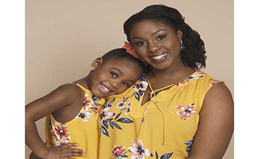 Mother and Daughter arm in arm.