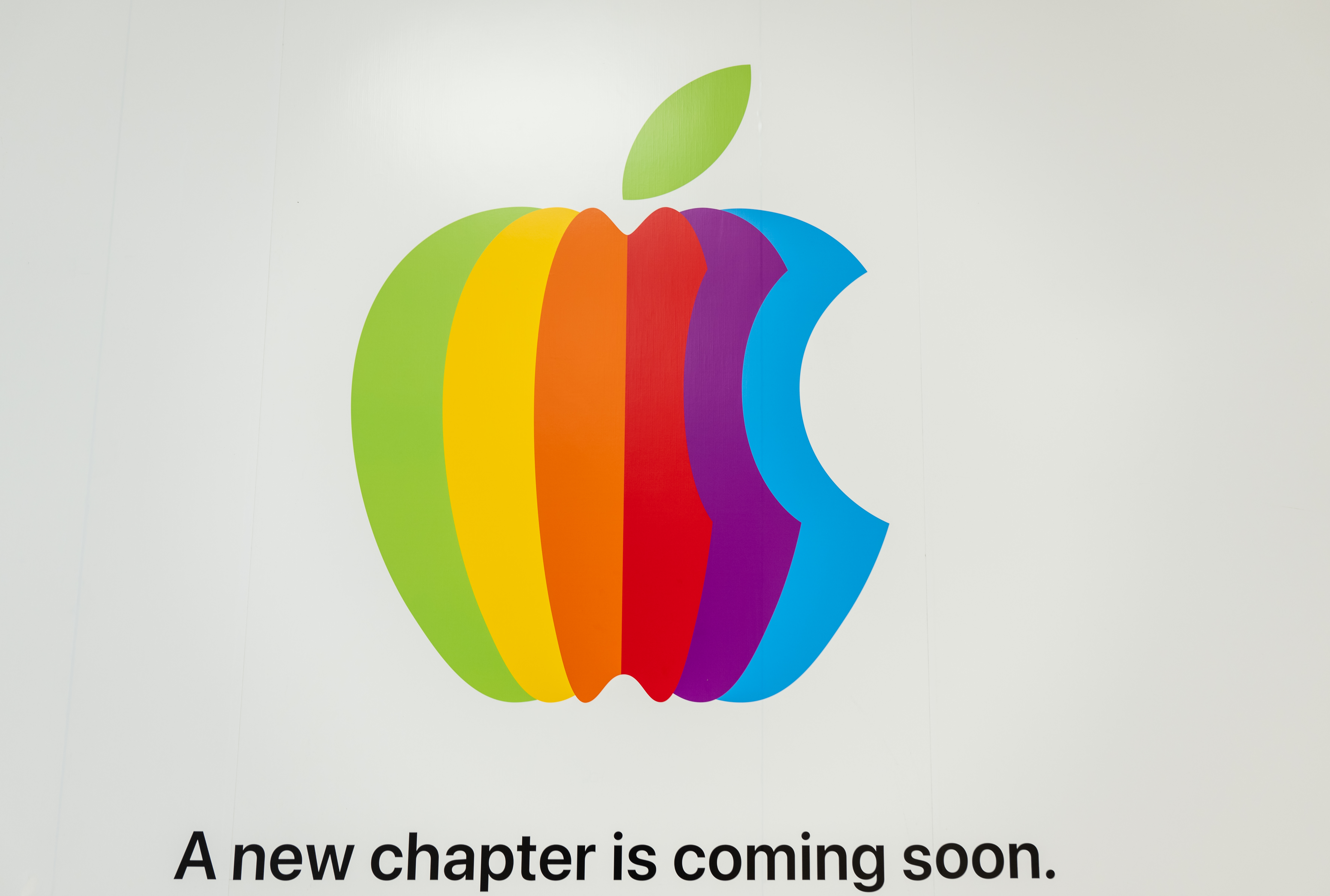 Colorful apple logo with text below that reads: A new chapter is coming soon